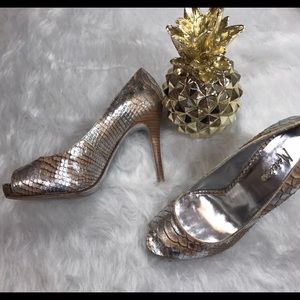 Marciano Peep-Toe Pumps